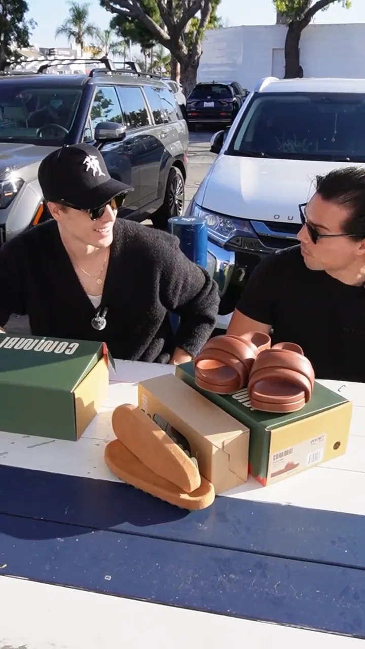 Still from the Commbi street-interview ad — a stranger reacting to the product on a Los Angeles sidewalk