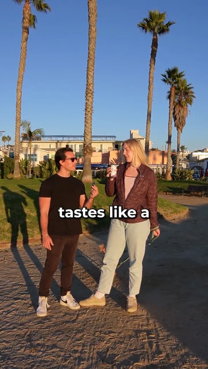 Still from the Happy Mountain street-interview ad — a stranger reacting to the product on a Los Angeles sidewalk